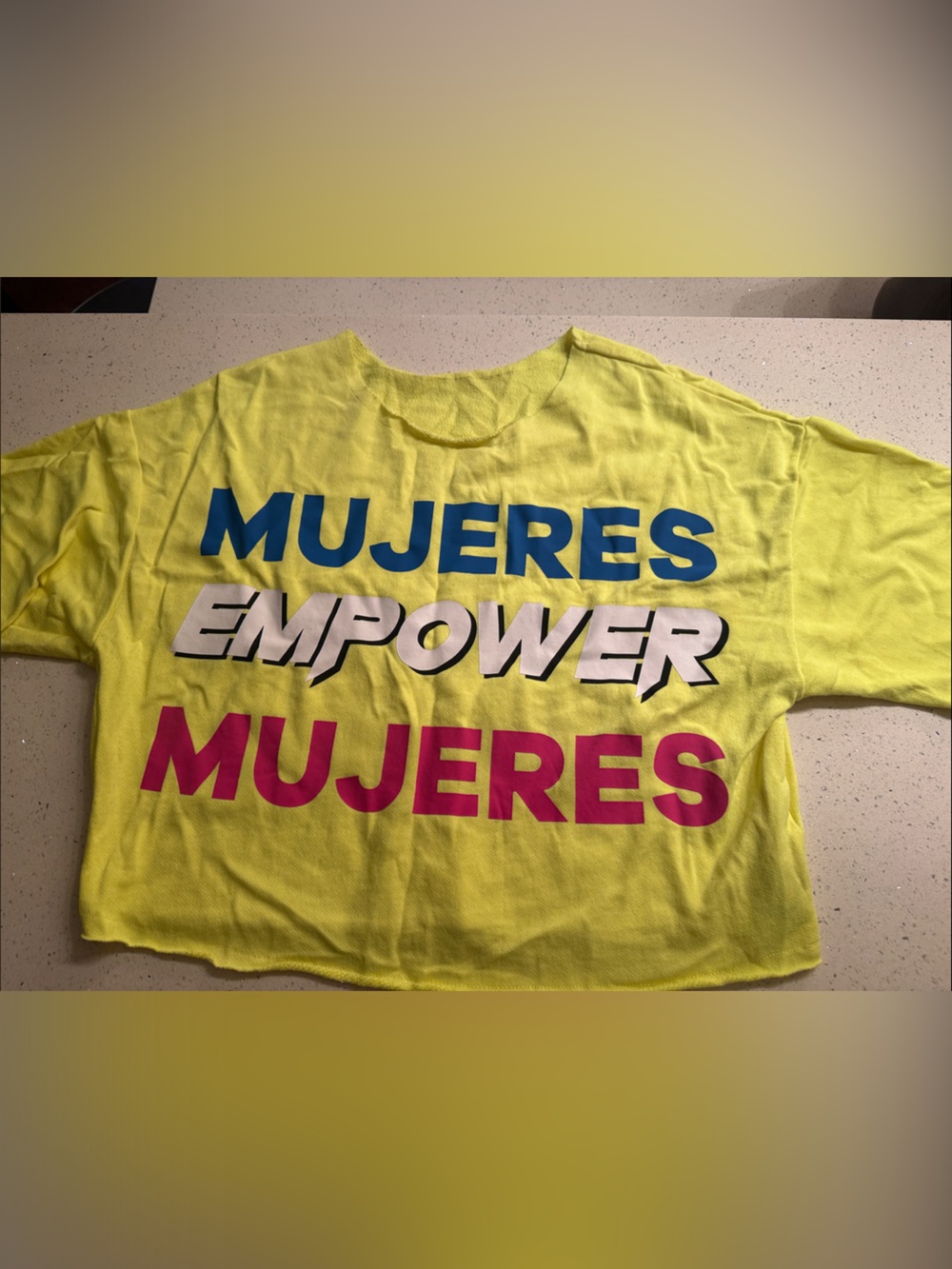 Zumba Fitness Yellow Crop Top with Blue, Pink, and White 'Mujeres' Graphic